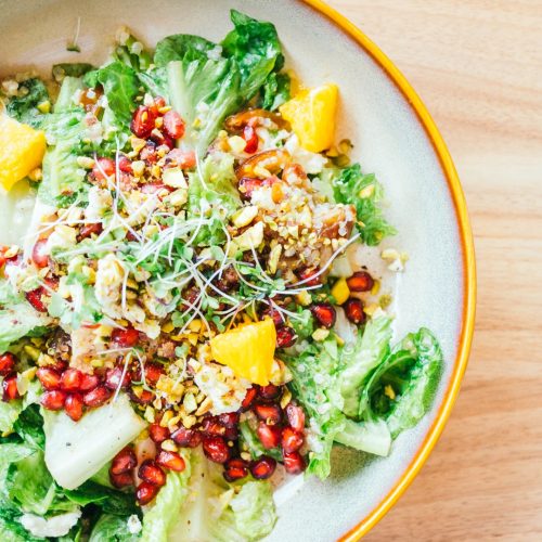Grilled chicken with vegetable and pomegranate , fruits salad in